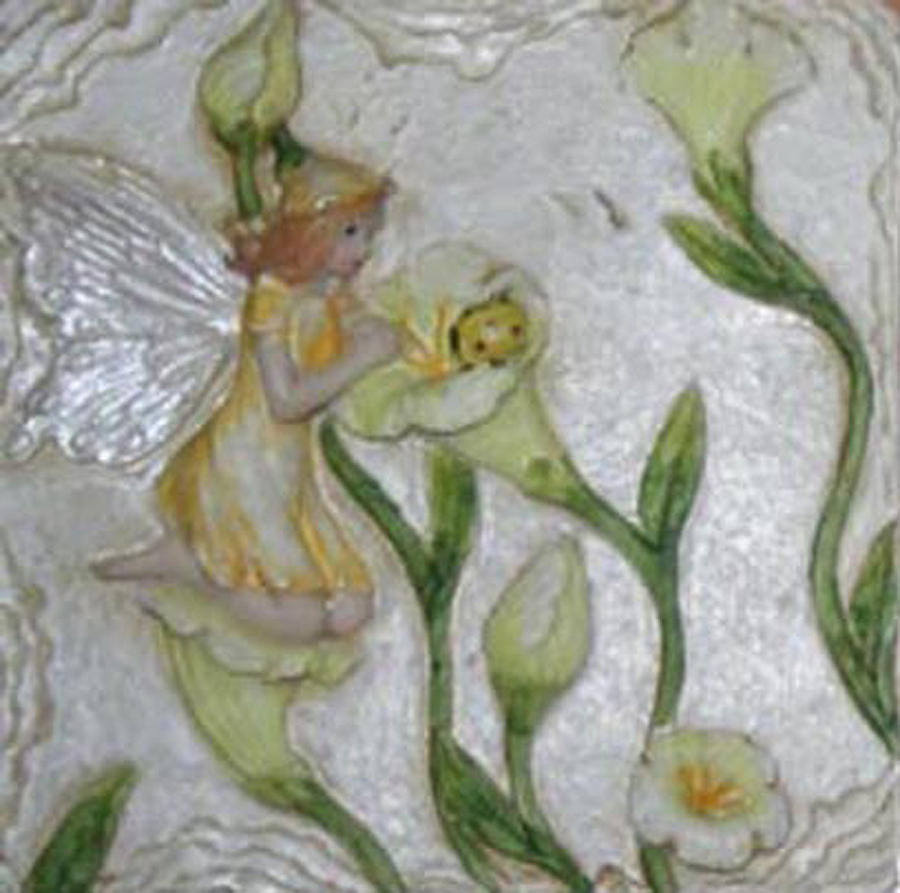Plastic tile of a flower fairy
